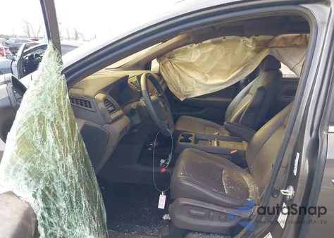 2021 Honda Odyssey Touring z USA, uszkodzony, nr VIN 5FNRL6H8XMB006701